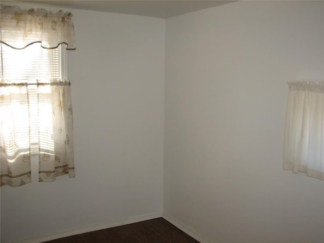 436 Brown St, Attleboro, MA 02703 - empty room featuring baseboards and dark wood-style floors