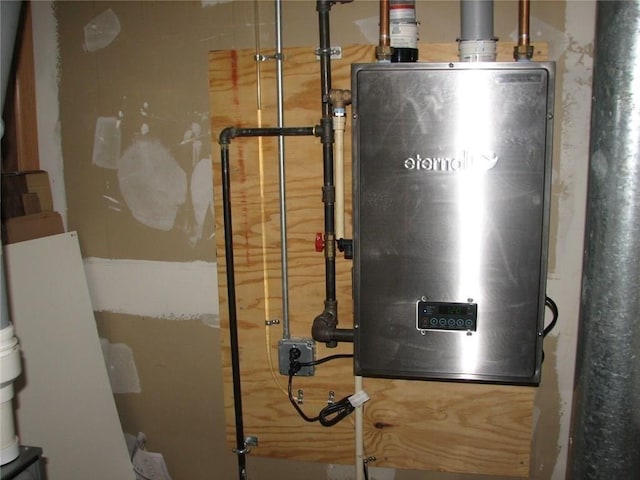 436 Brown St, Attleboro, MA 02703 - utility room featuring water heater