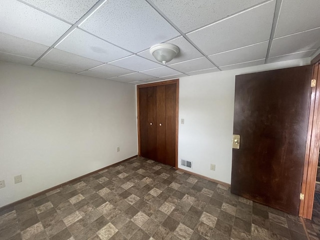 436 Brown St, Attleboro, MA 02703 - unfurnished bedroom featuring baseboards, a paneled ceiling, and a closet