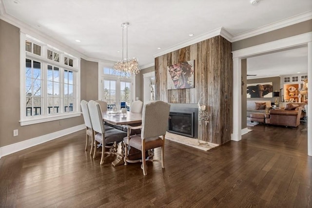 dining room featuring a notable chandelier, dark hardwood / wood-style floors, crown molding, and french doors