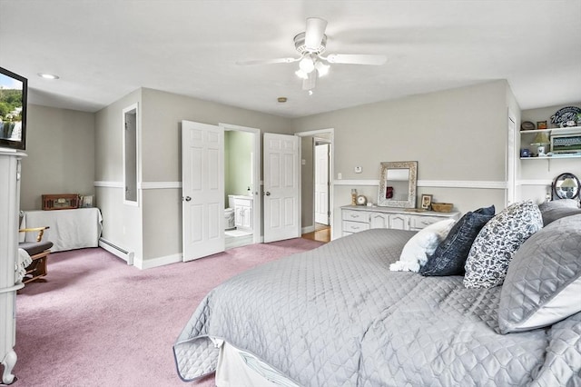bedroom featuring carpet flooring, connected bathroom, a ceiling fan, baseboards, and a baseboard heating unit