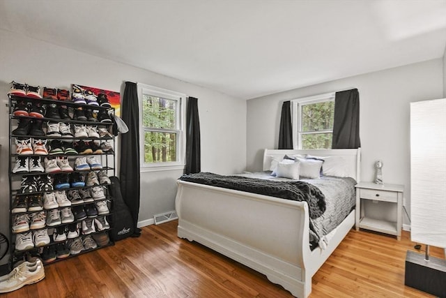 180 Slab Bridge Rd, Freetown, MA 02702 - bedroom with wood finished floors and baseboards