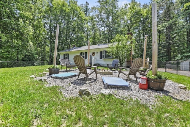 180 Slab Bridge Rd, Freetown, MA 02702 - back of house featuring an outdoor fire pit and a patio