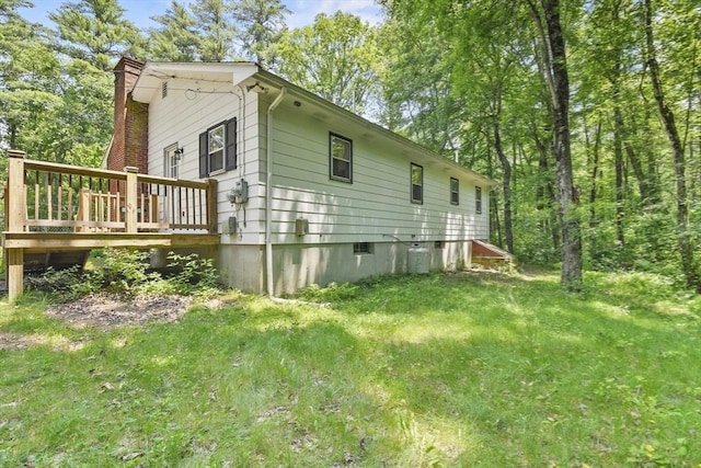 180 Slab Bridge Rd, Freetown, MA 02702 - view of side of property with a deck and a chimney