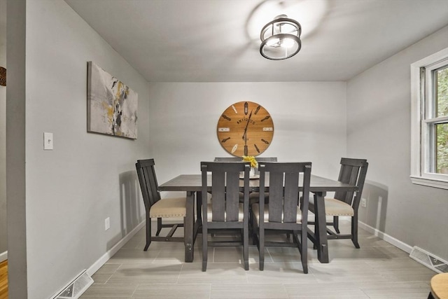 180 Slab Bridge Rd, Freetown, MA 02702 - dining room with baseboards and wood finished floors