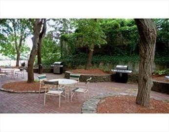 view of property's community featuring a patio