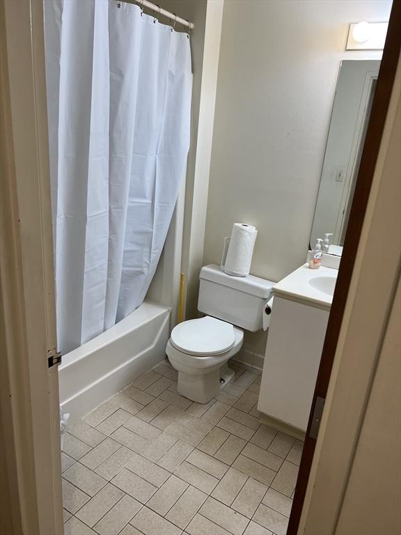 87 Gainsborough St Unit 202, Boston, MA 02115 - bathroom with tile patterned floors, vanity, and shower / tub combo