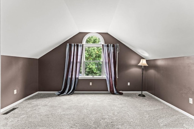 3 Norumbega Cir, Franklin, MA 02038 - bonus room with lofted ceiling, carpet, and baseboards