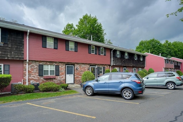 280 Elm St Unit 26, Marlborough, MA 01752 - view of front of house featuring uncovered parking and brick siding