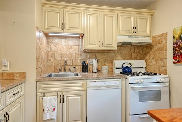 280 Elm St Unit 26, Marlborough, MA 01752 - kitchen with white appliances, under cabinet range hood, a sink, cream cabinetry, and light countertops
