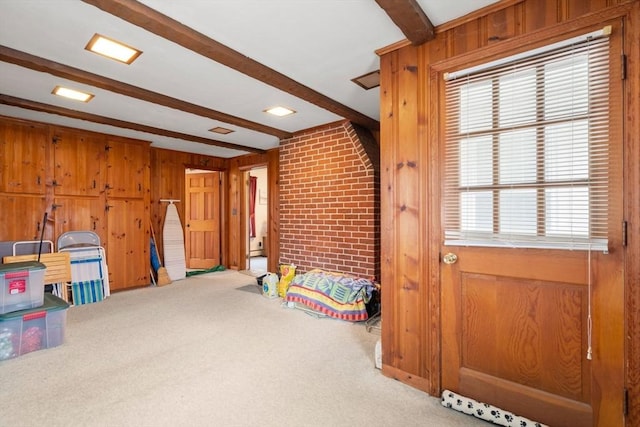 160 Shrewsbury St, Holden, MA 01520 - game room featuring beamed ceiling, brick wall, wood walls, and carpet floors