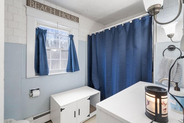 160 Shrewsbury St, Holden, MA 01520 - full bathroom featuring a baseboard heating unit and a shower with shower curtain