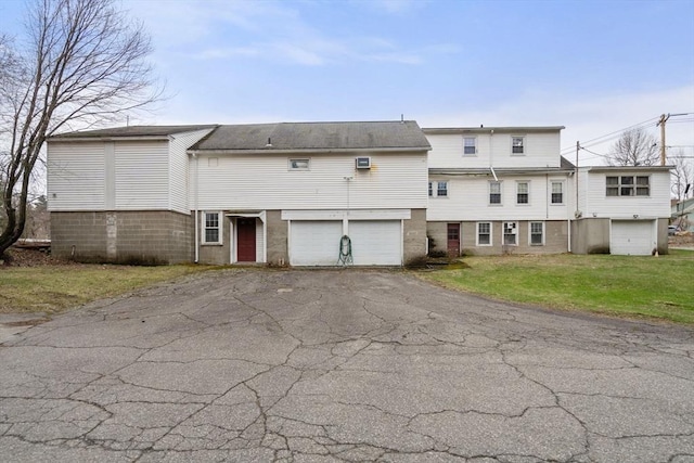 160 Shrewsbury St, Holden, MA 01520 - back of property featuring a lawn, aphalt driveway, and a garage