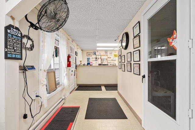 160 Shrewsbury St, Holden, MA 01520 - hallway with tile patterned floors, a drop ceiling, baseboards, and baseboard heating