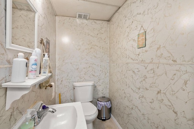 160 Shrewsbury St, Holden, MA 01520 - half bath with toilet, a sink, and visible vents