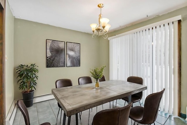 tiled dining space featuring baseboard heating and a notable chandelier