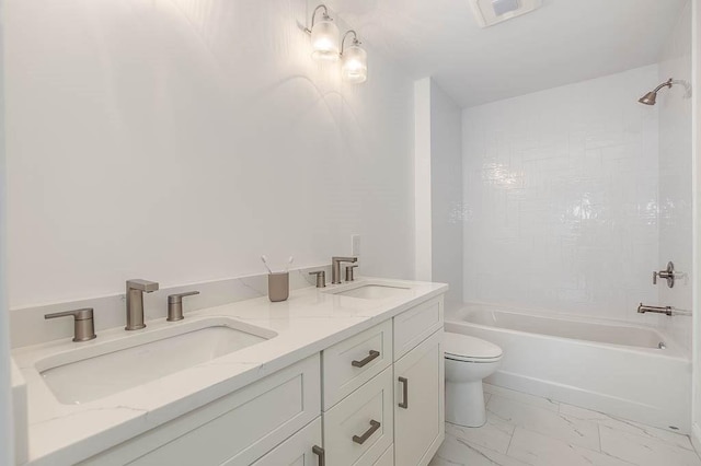 131 Colts Way, Attleboro, MA 02703 - bathroom featuring marble look tile flooring, toilet, shower / washtub combination, and double vanity