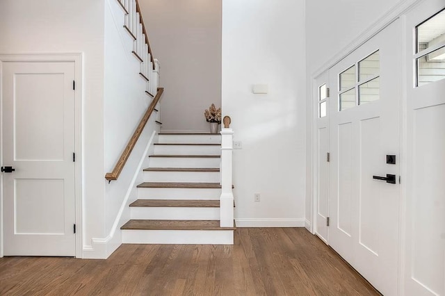 131 Colts Way, Attleboro, MA 02703 - entryway featuring wood finished floors, stairway, and baseboards
