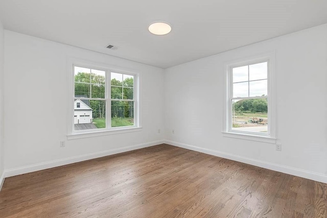 131 Colts Way, Attleboro, MA 02703 - empty room with wood finished floors and baseboards