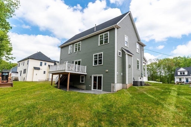 131 Colts Way, Attleboro, MA 02703 - rear view of house featuring a wooden deck, a lawn, a patio area, and cooling unit