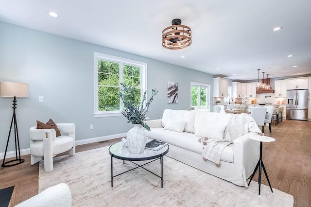 131 Colts Way, Attleboro, MA 02703 - living area with baseboards, light wood-type flooring, and recessed lighting