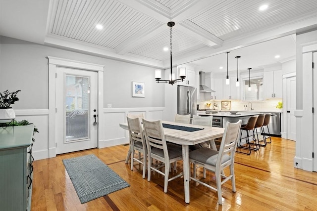 31 Henderson St Unit 1, Arlington, MA 02474 - dining area featuring a chandelier, recessed lighting, light wood-type flooring, a wainscoted wall, and ornamental molding