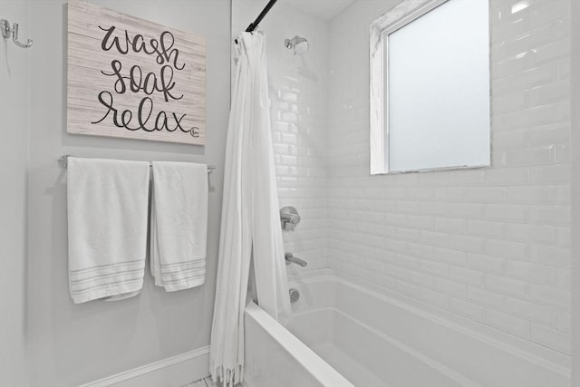 31 Henderson St Unit 1, Arlington, MA 02474 - full bath featuring shower / bath combo with shower curtain