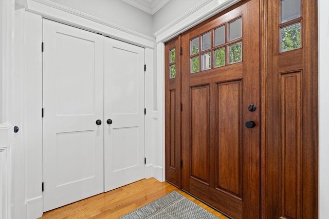 31 Henderson St Unit 1, Arlington, MA 02474 - foyer entrance featuring crown molding and light wood-style floors