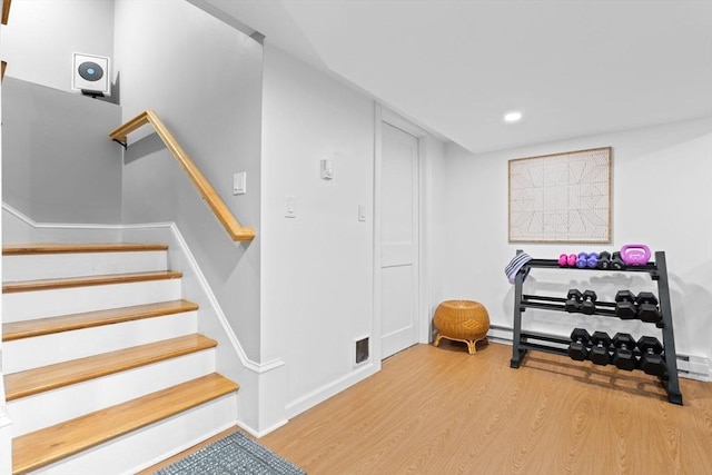 31 Henderson St Unit 1, Arlington, MA 02474 - workout area with wood finished floors, recessed lighting, and baseboards