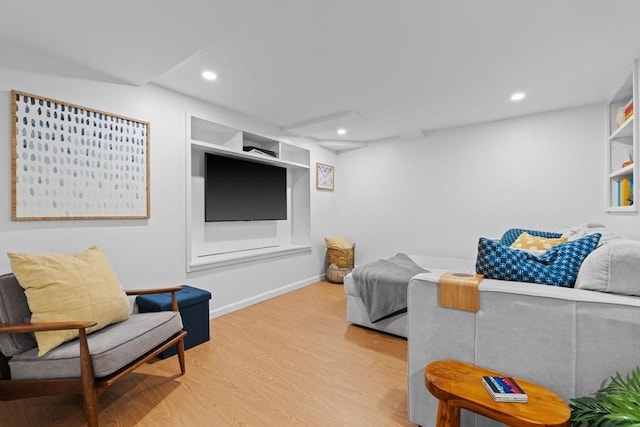 31 Henderson St Unit 1, Arlington, MA 02474 - living area with wood finished floors, recessed lighting, and baseboards