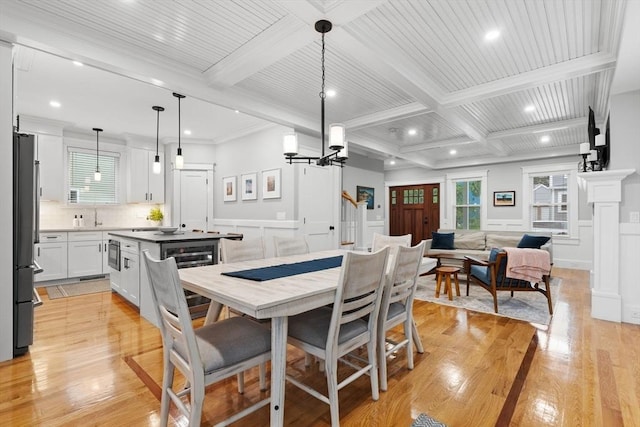 31 Henderson St Unit 1, Arlington, MA 02474 - dining space with a decorative wall, beam ceiling, light wood-style flooring, coffered ceiling, and recessed lighting