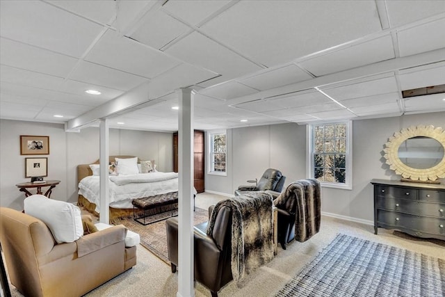 bedroom with carpet floors, baseboards, a drop ceiling, and recessed lighting