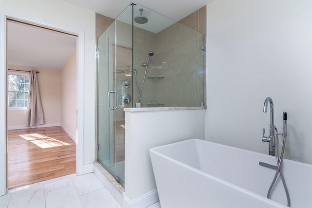 bathroom with independent shower and bath