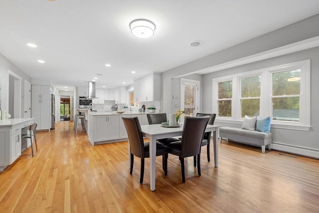 14 Preservation Way, Westford, MA 01886 - dining space with light wood finished floors, a baseboard radiator, and recessed lighting