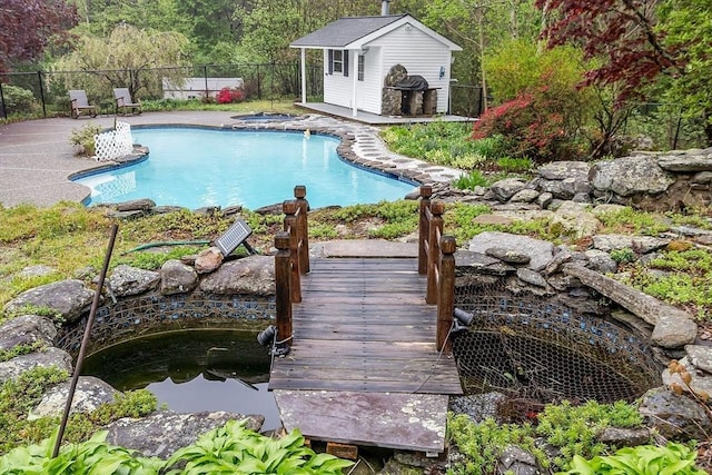 14 Preservation Way, Westford, MA 01886 - view of pool with fence and an outdoor structure
