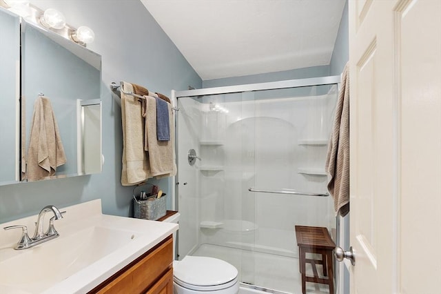 425 Main St Unit 8B, Hudson, MA 01749 - bathroom featuring a stall shower, toilet, and vanity