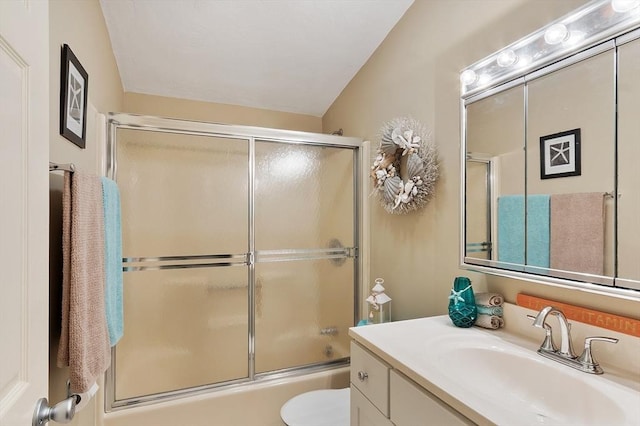 425 Main St Unit 8B, Hudson, MA 01749 - full bathroom with vanity, toilet, and shower / bath combination with glass door