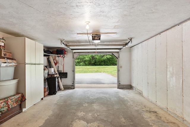 425 Main St Unit 8B, Hudson, MA 01749 - garage featuring a garage door opener