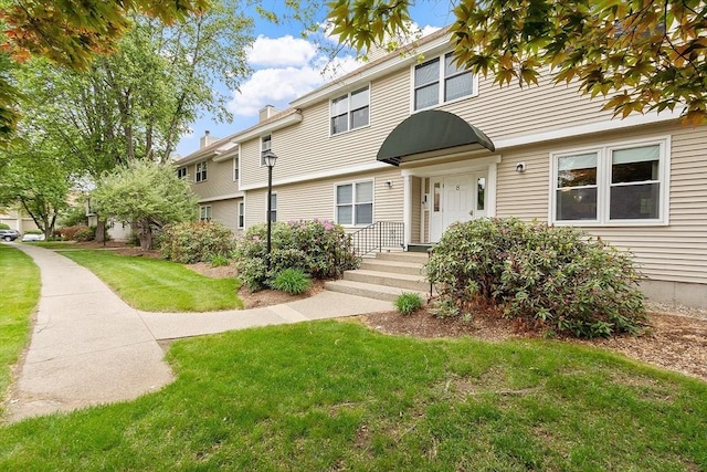 425 Main St Unit 8B, Hudson, MA 01749 - colonial inspired home with a front yard