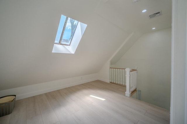 36-38 Elm Hill Park, Boston, MA 02121 - additional living space with a skylight, lofted ceiling, wood finished floors, and recessed lighting