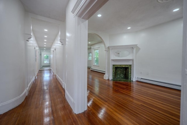 36-38 Elm Hill Park, Boston, MA 02121 - hallway with a baseboard heating unit, hardwood / wood-style floors, arched walkways, baseboard heating, and recessed lighting