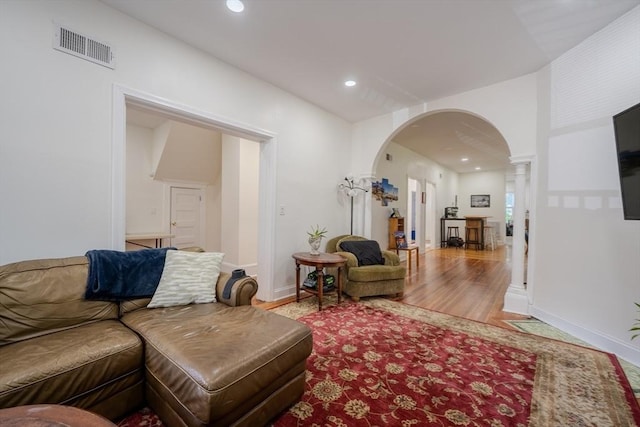 36-38 Elm Hill Park, Boston, MA 02121 - living room featuring arched walkways, wood finished floors, recessed lighting, and baseboards