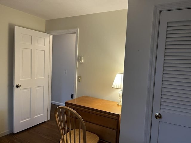 office area with dark hardwood / wood-style flooring