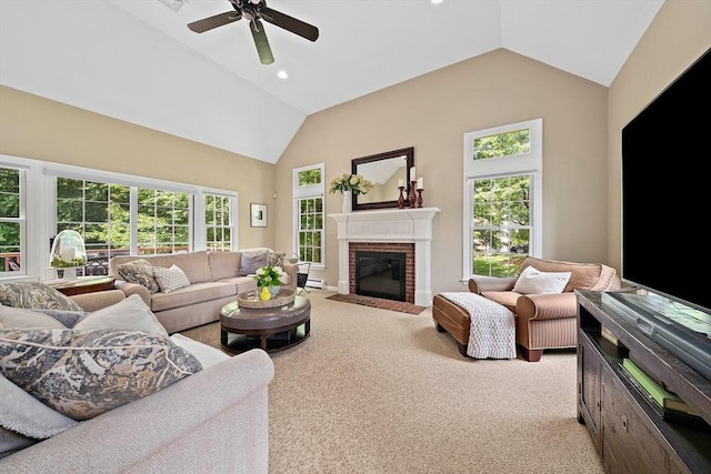 148 Old Schoolhouse Ln, Hanover, MA 02339 - carpeted living area featuring plenty of natural light, ceiling fan, a fireplace, and high vaulted ceiling