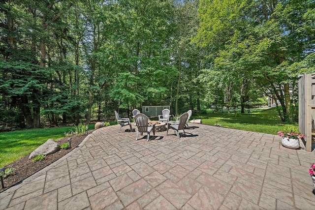 148 Old Schoolhouse Ln, Hanover, MA 02339 - view of patio with a fire pit