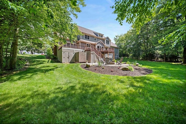 148 Old Schoolhouse Ln, Hanover, MA 02339 - rear view of house with stairs, a wooden deck, a yard, and a patio