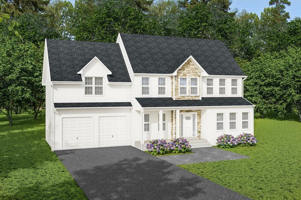 view of front of property featuring an attached garage, driveway, stone siding, and a front yard