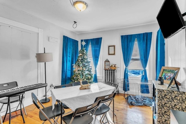 dining area with light hardwood / wood-style floors