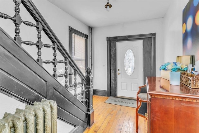 entrance foyer featuring hardwood / wood-style floors