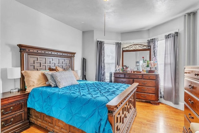 bedroom featuring light wood-type flooring